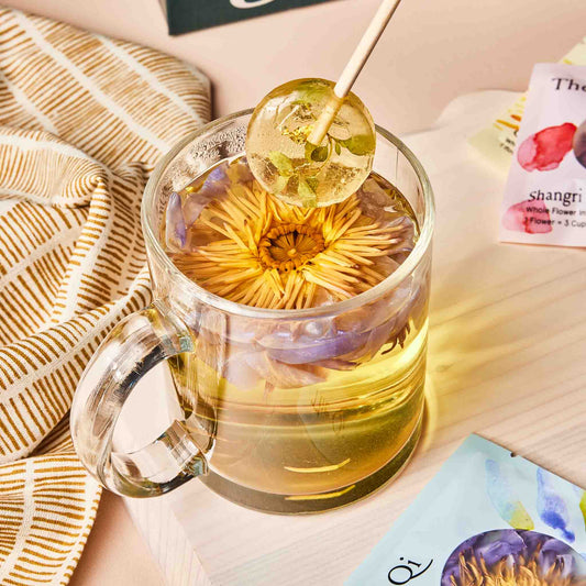 Everyone Loves Flowers Blooming Cup of Tea Gift Box prepared beverage.