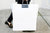 Woman carrying a bag.