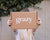 Woman holding a Grazy box.